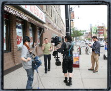 Executing a walk-and-talk on Blue Island Ave with the crew from Luminar Productions.